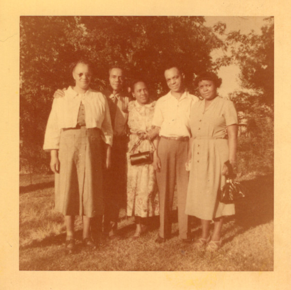Group of five outdoors by Unknown