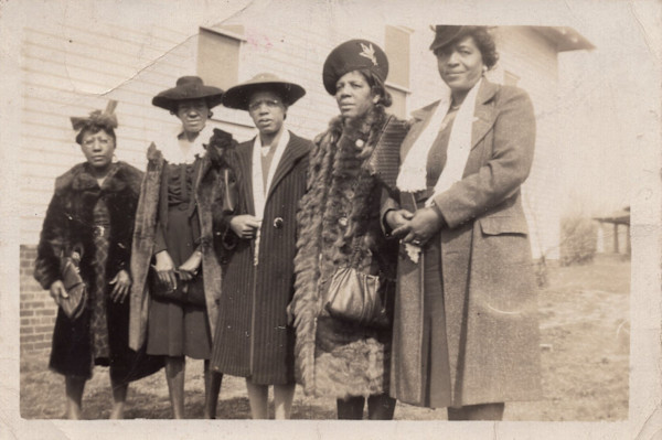 Five Women standing in a line by Unknown