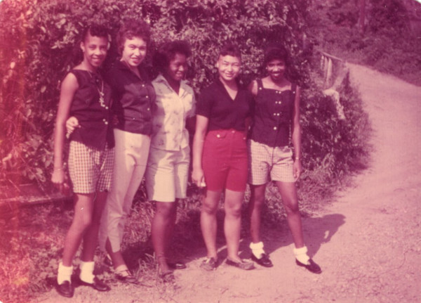 Five women in short pants by Unknown