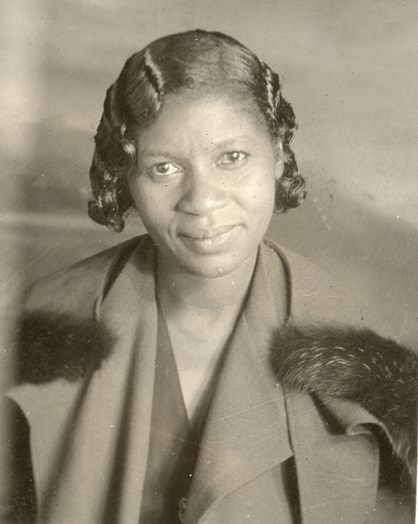 Woman with fur shoulders by Unknown