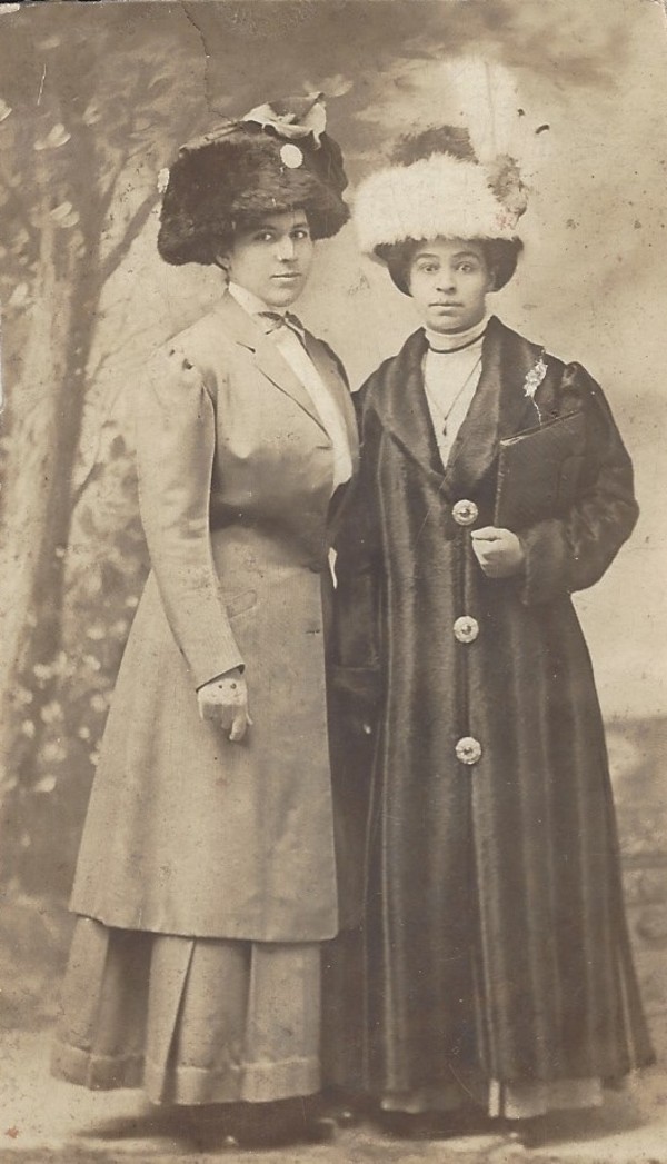 Two women in large hats by Unknown