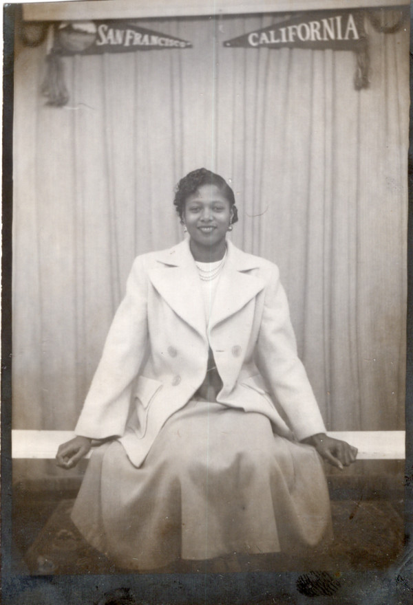 Young woman with San Francisco & California pennants by Unknown