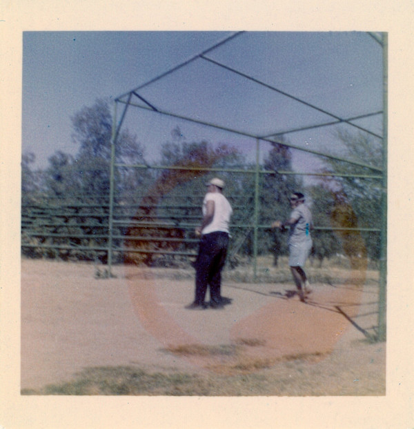 Ball game & spectators by Unknown