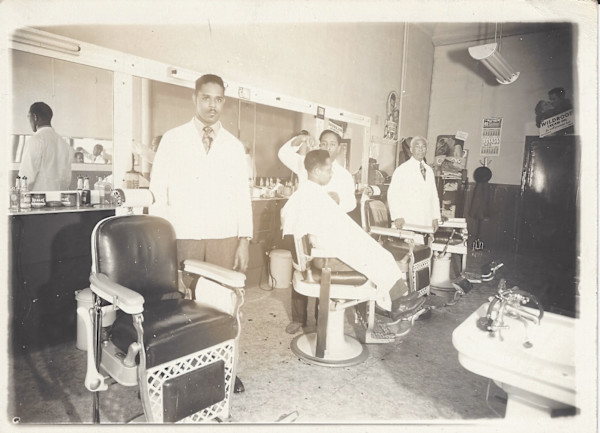 Men in Barber shop by Unknown