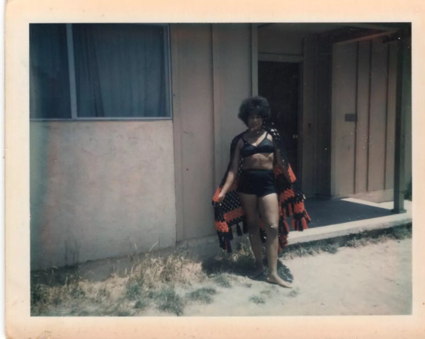 Verlene Sawyer (in black underwear with afghan) by Unknown