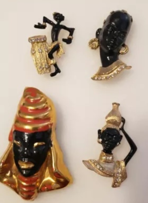 Blackamoor brooch lot by Unknown