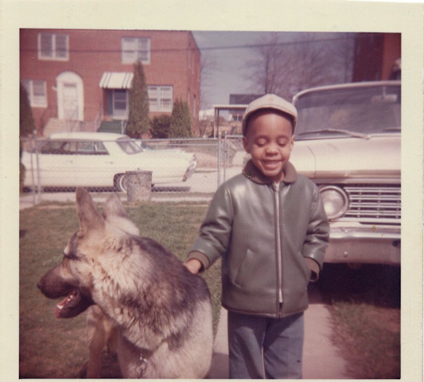 5 years old (boy with shepherd dog) by Unknown