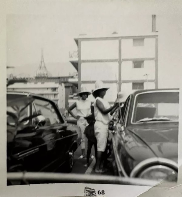 Two women with tower in background, Carlisle, PA by Unknown