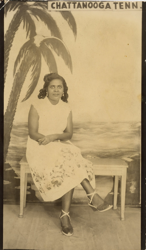Seated young woman with beach backdrop (Chattanooga, Tenn.) by Unknown