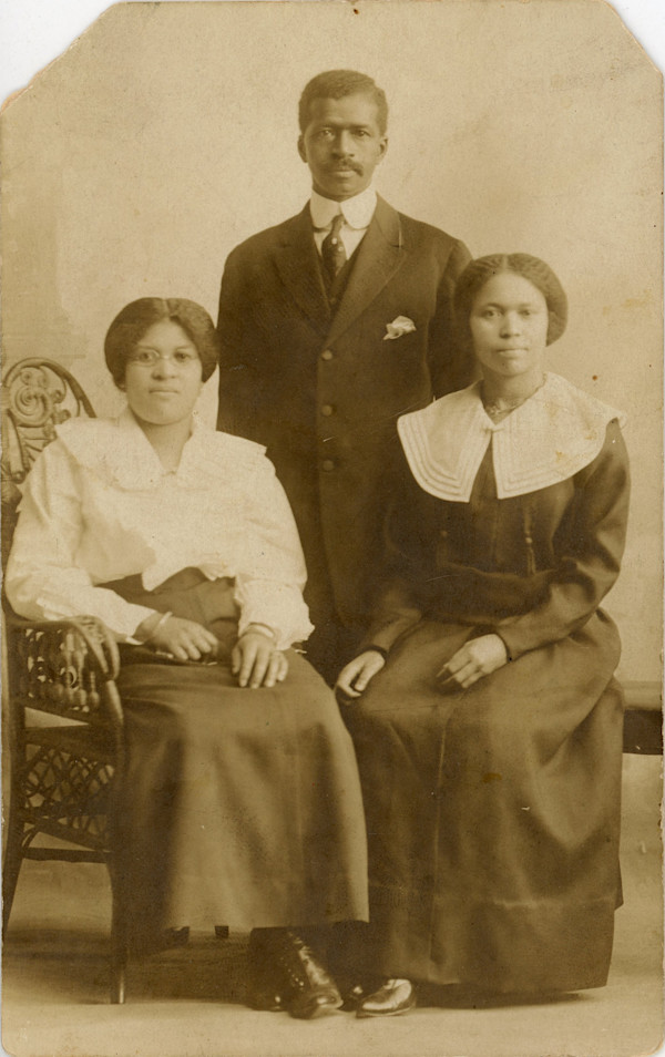 This is Cherrie, Rhod, & Anthony in a group by Unknown