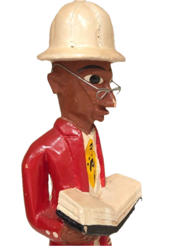 Colon figure reading by Unknown