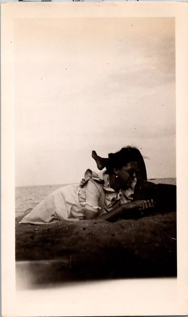 Couple on the beach by Unknown