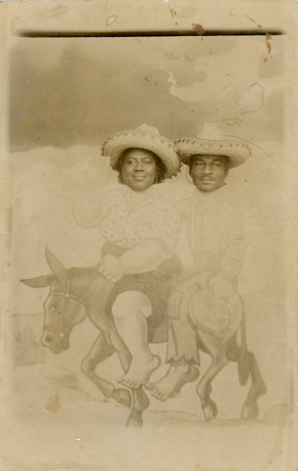 Couple on a donkey by Unknown