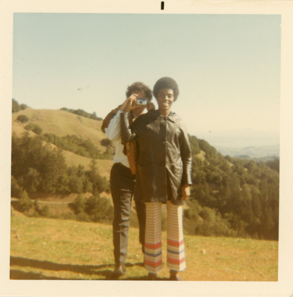 Couple with camera by Unknown
