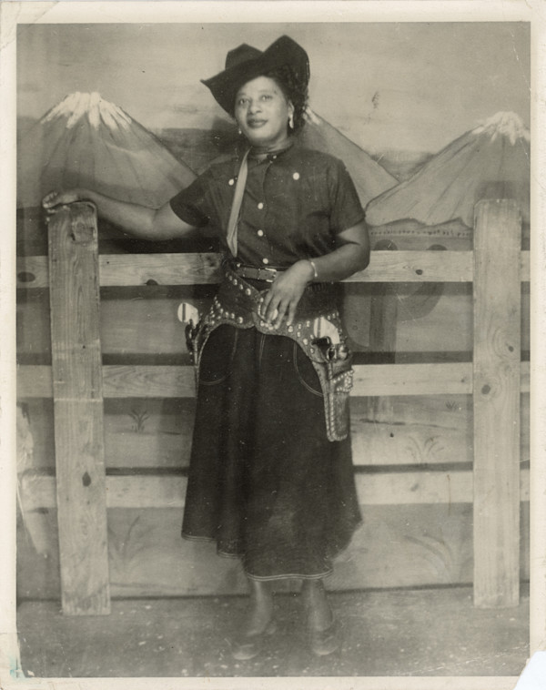 Woman in cowgirl costume by Unknown