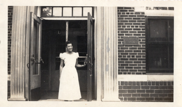 Woman at Currier Hall, Iowa University by Unknown