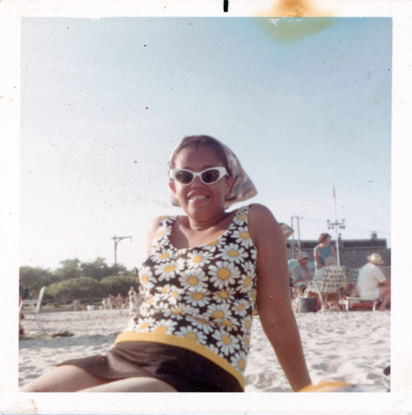 Daisy swimsuit on the beach by Unknown