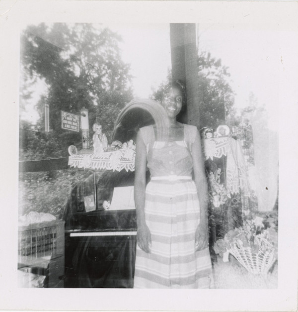 Double exposure in window by Unknown