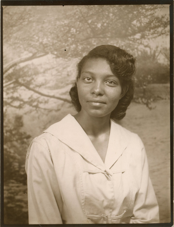 Woman with dreamy expression by Unknown