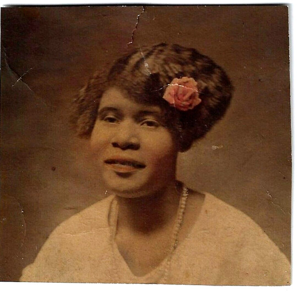 Flapper Beauty with flower by Unknown