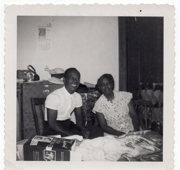 "Send this on back" (man & woman with Polaroid Land Camera box) by Unknown