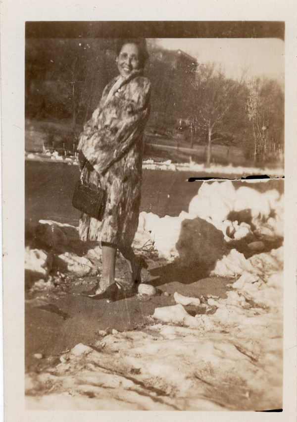 Woman in fur coat by Unknown