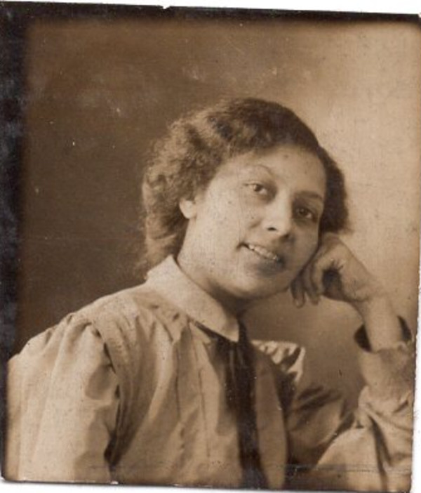 Gem miniature of woman wearing posing with head on hand by Unknown