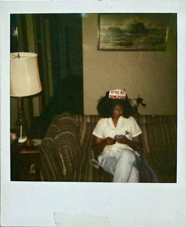 Woman in "Give me some pussy" hat by Unknown