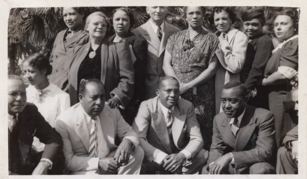 Group of men and women by Unknown