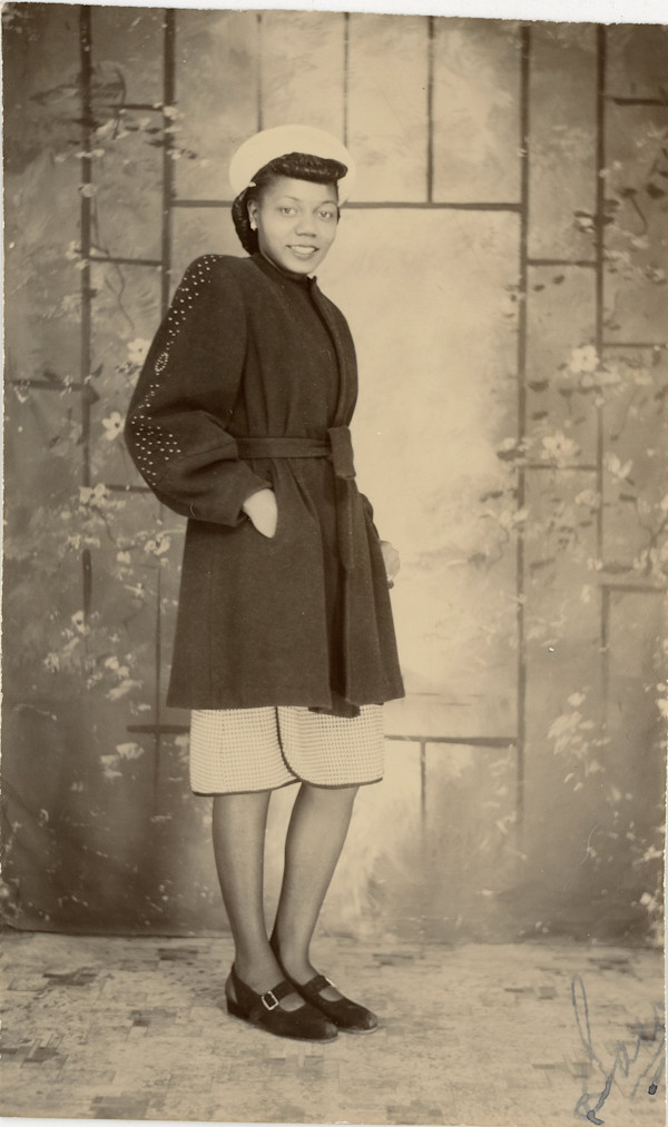 Woman with hand in pocket by Unknown