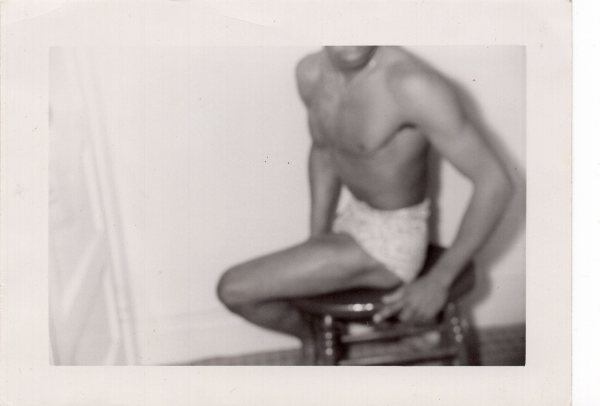 Headless man posing by Unknown