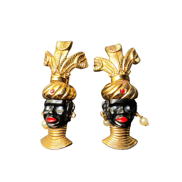Pair of blackamoor brooches with gold plumes by Unknown