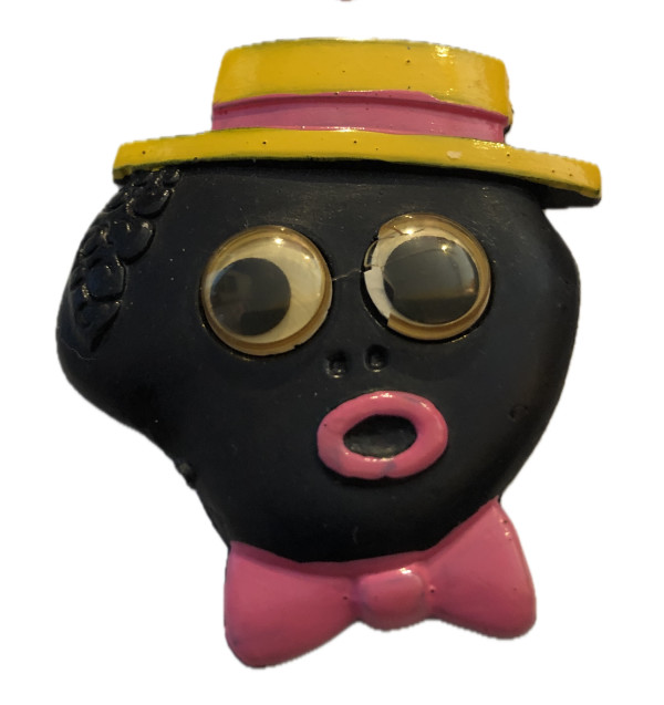 Golliwog pin (yellow boater) by Unknown