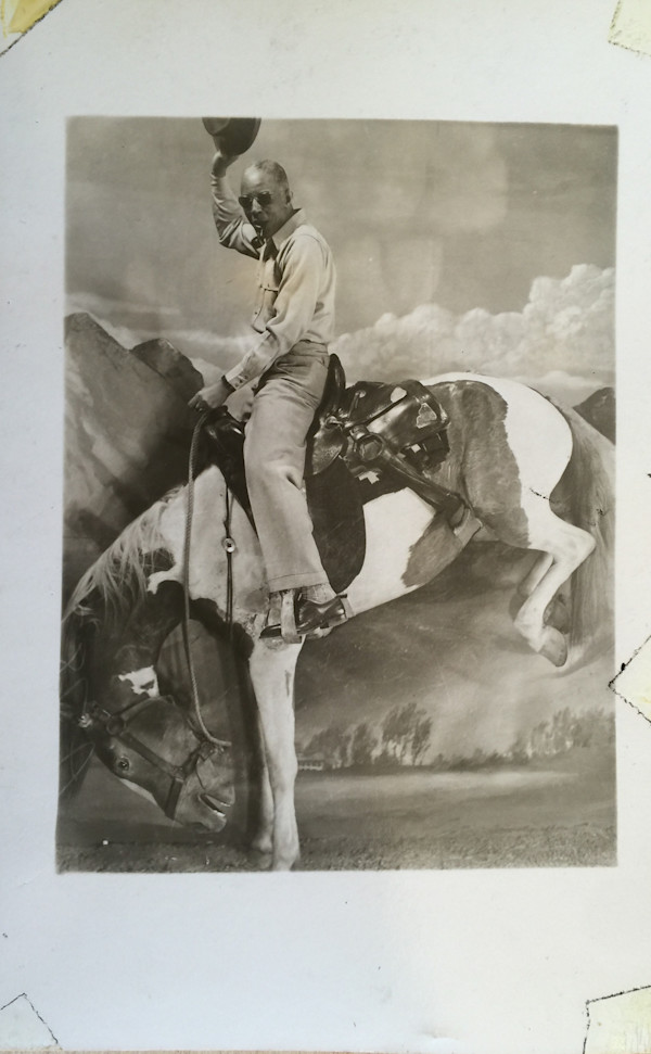 Man on prop horse by Unknown