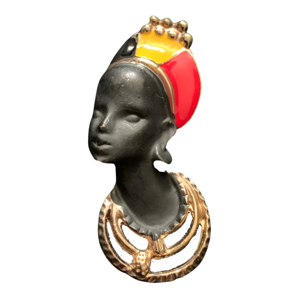 African woman with red, yellow, and black headpiece and necklaces Brooch by Unknown