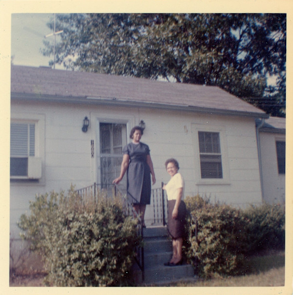 Lillie Estes Starks and friend outside house by Unknown