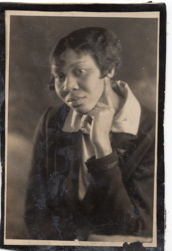 Lincoln University student (chin on hand) by Unknown