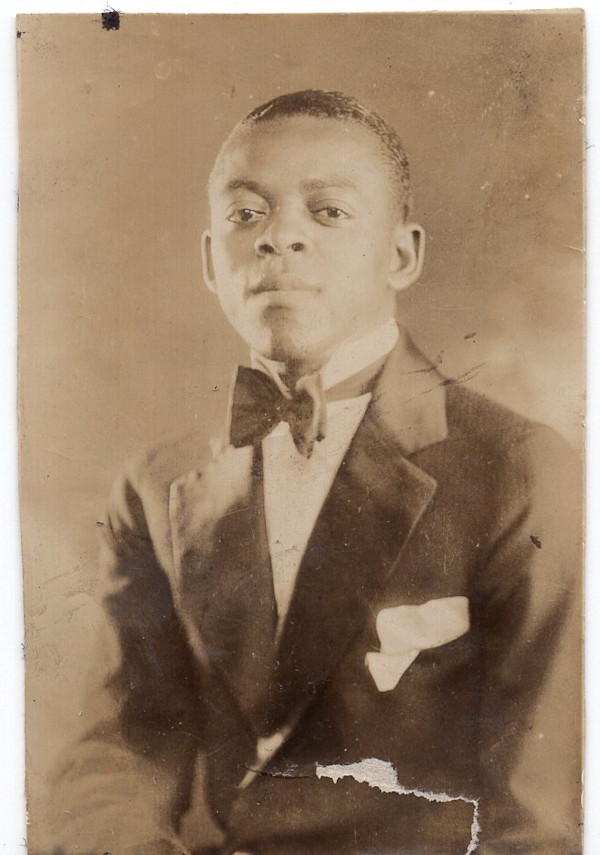 Lincoln University student (bowtie) by Unknown