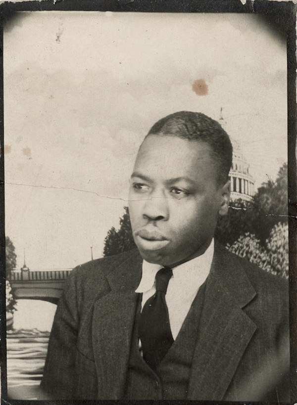 Man with Capitol backdrop by Unknown