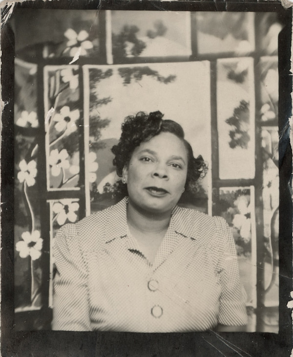 Woman with open window & flowers backdrop by Unknown