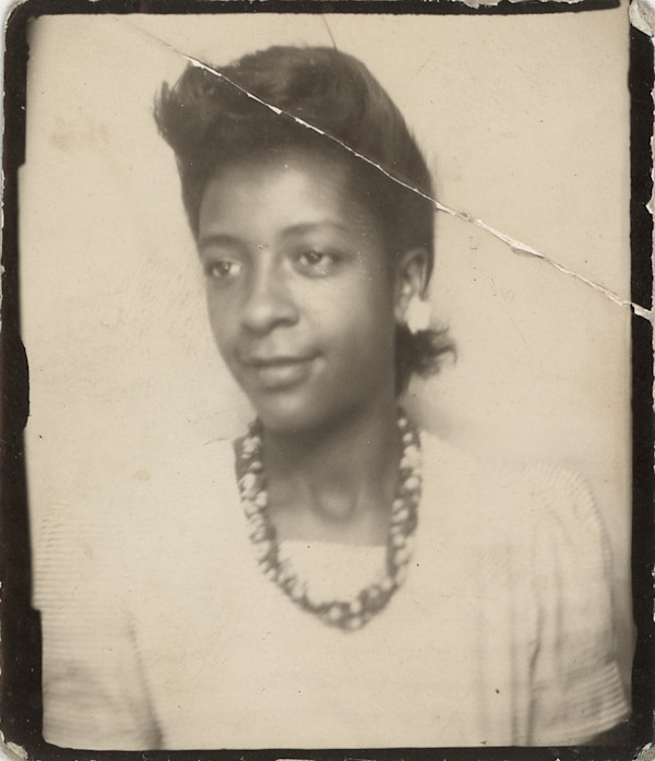 Young woman in necklace by Unknown