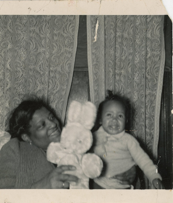 Woman and toddler with bunny by Unknown