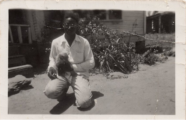 M. Jackson (holding dog), Teague, Texas by Unknown