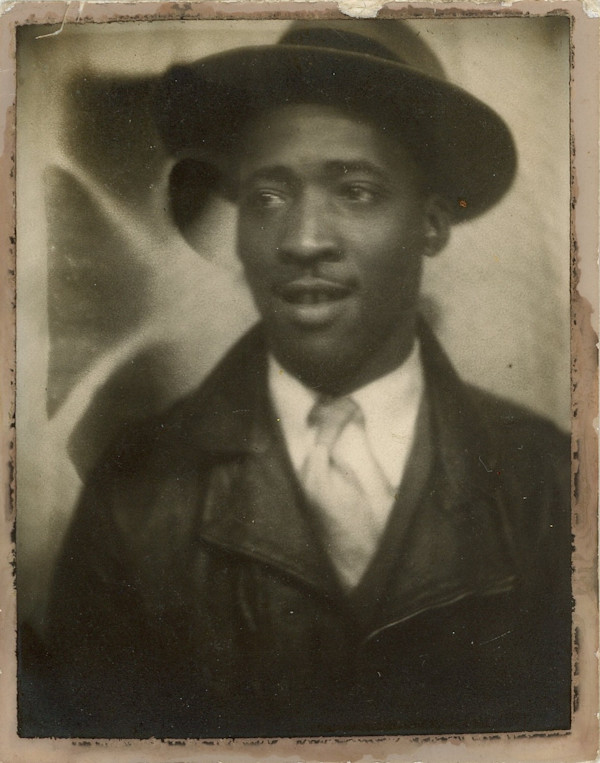 Man with abstract backdrop by Unknown