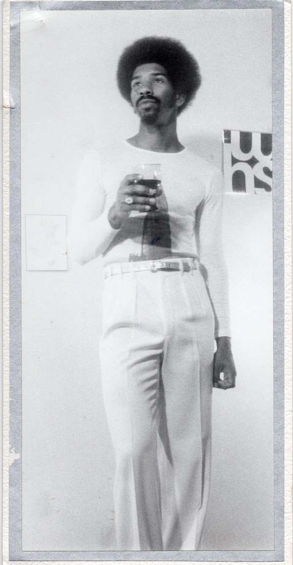 Man posing by Unknown