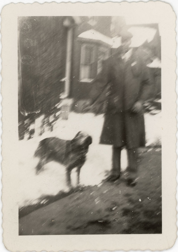 Man with dog by Unknown