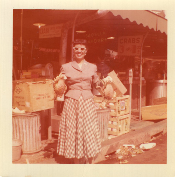 Martha holding crabs by Unknown