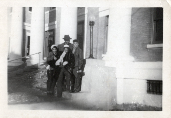 Martha Weaver (right) and others on stoop by Unknown