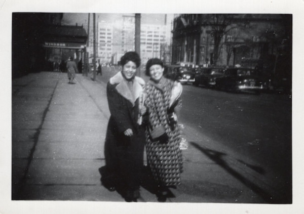 Martha Weaver and unknown woman on the sidewalk by Unknown
