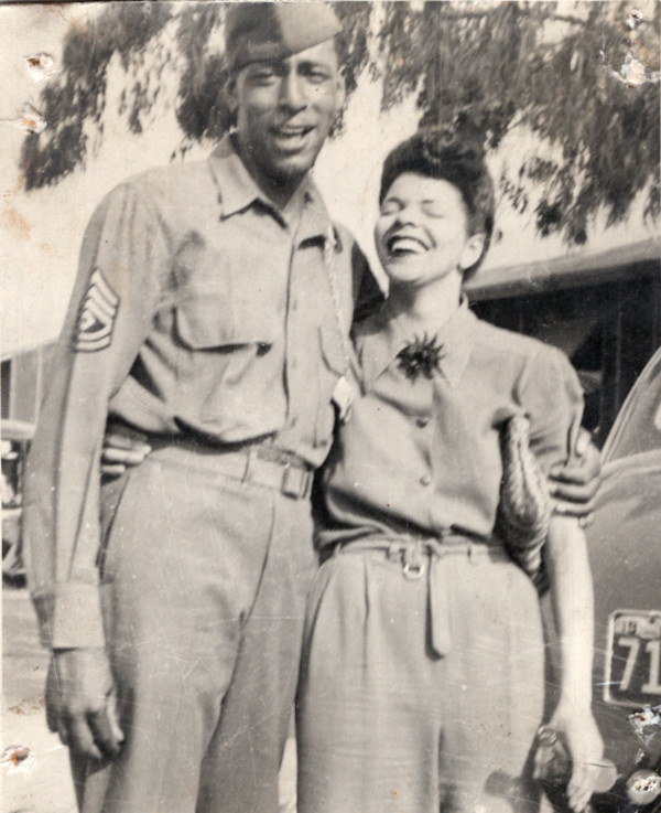 Soldier with laughing woman by Unknown